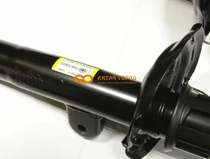 Стойка амортизатора передняя левая FAW B70